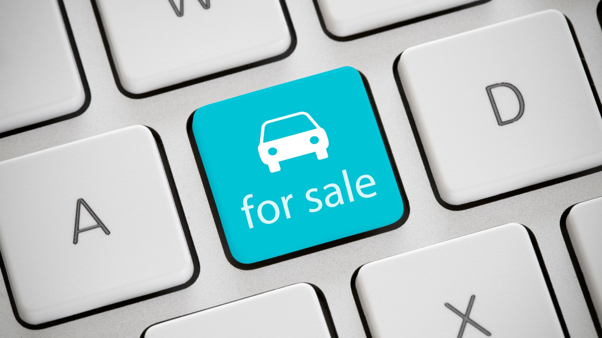 Car for sale button on keyboard highlighting online vehicle marketplace